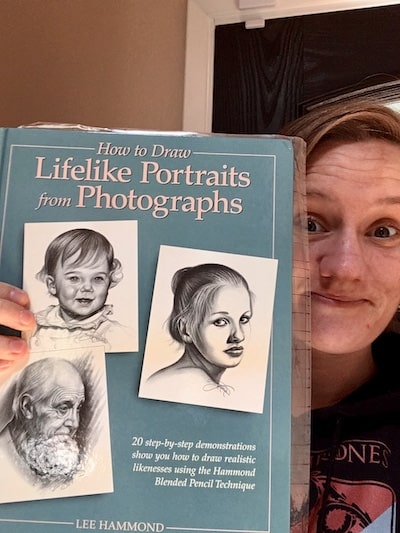 woman with how to draw lifelike portraits from photographs book