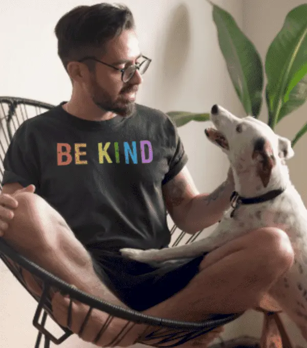 picture of man with be kind shirt and dog