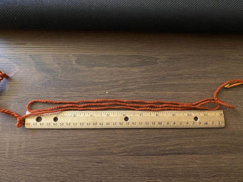 measuring yarn with a ruler