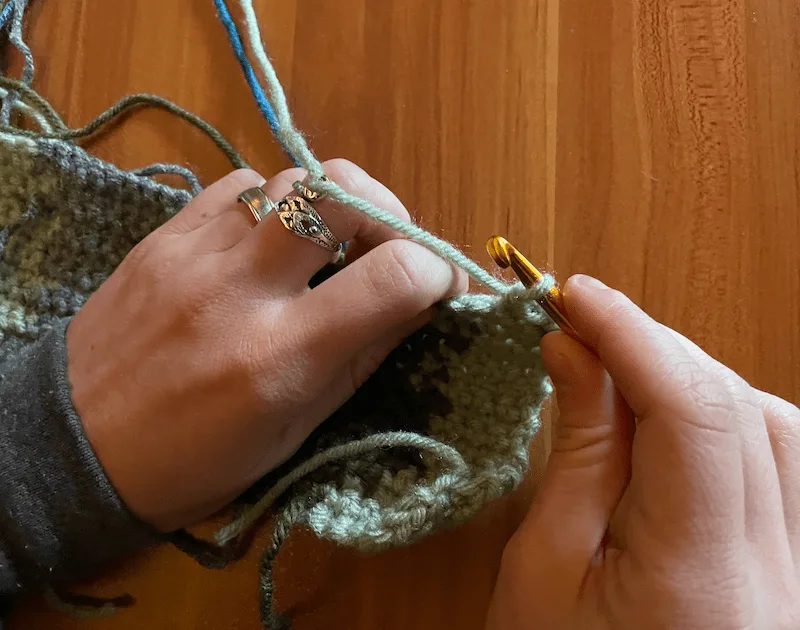 crochet with yarn guide ring below the knuckle