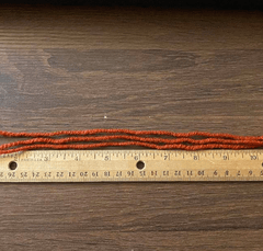 measuring yarn with a ruler