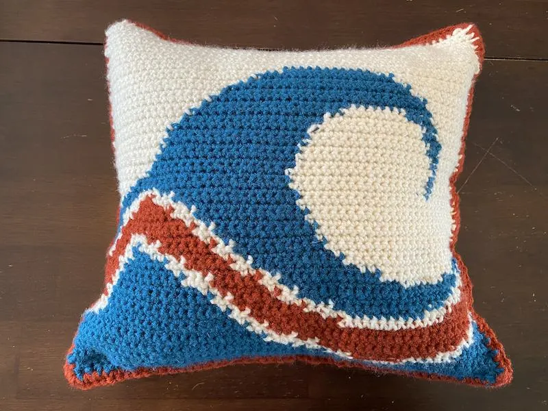 crochet pillow with wave design