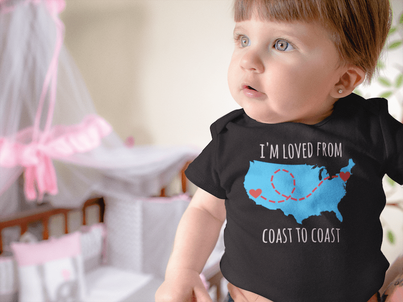 baby in coast to coast body suit mockup